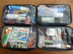 Zuca compartments filled with cosmetics and first aid