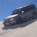 descending steep sand dune