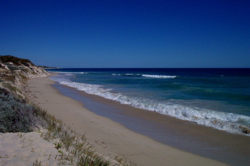 Driving on sand - Narrow, boggy, sloping beach, two rocks, western australia
