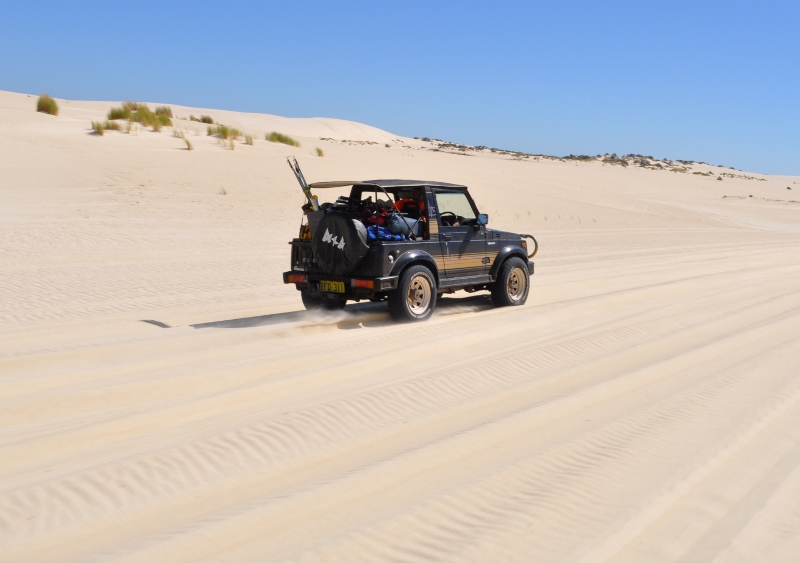 sierra cruising through sand dunes