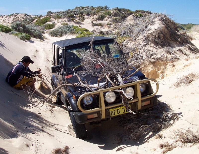 wheel lifted, start shovelling