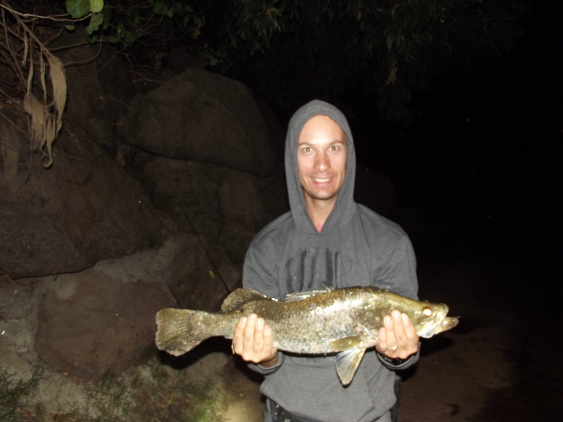 Joe with barra at cahill crossing. Let the feast begin.