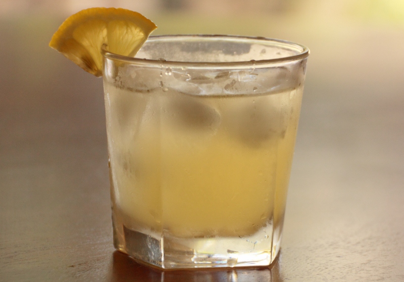 apple cider garnished with lemon