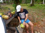 chopping green coconut at chili beach