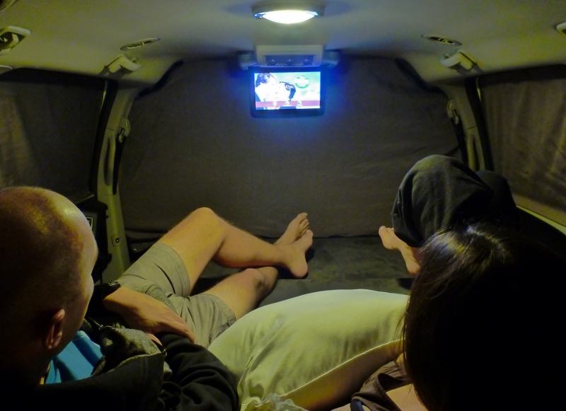 watching dvd in walmart carpark